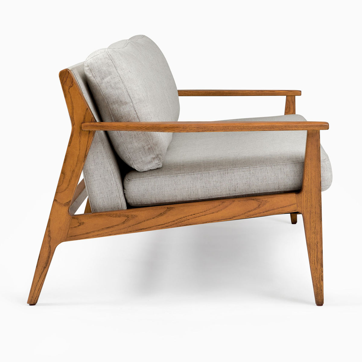 Wooden armchair with gray cushion on a white background