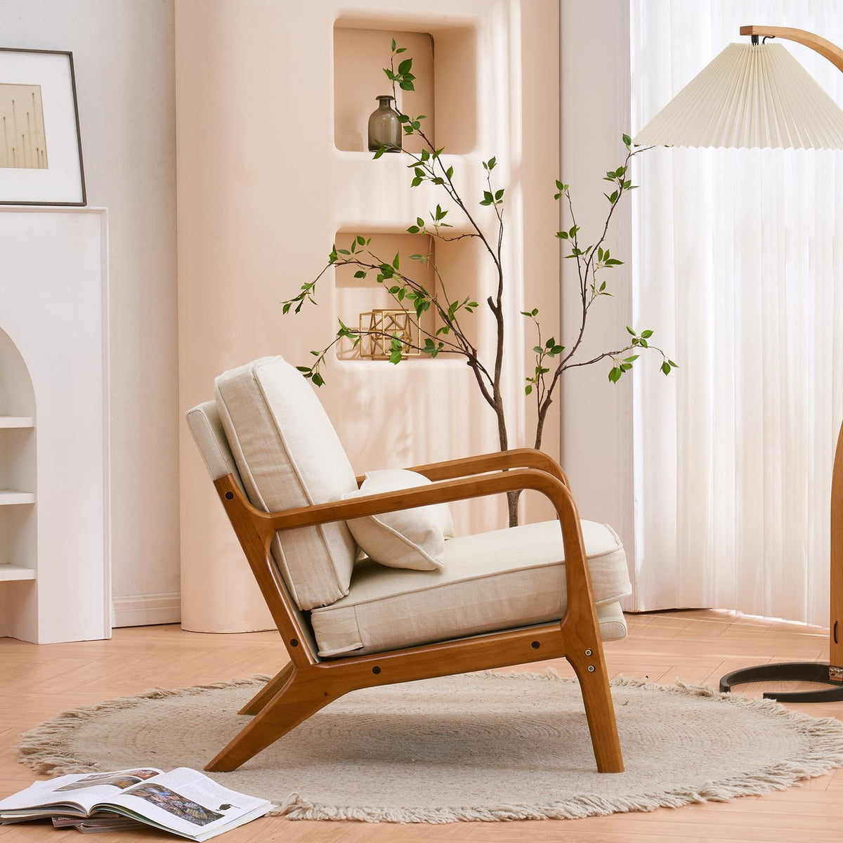 Wooden armchair with white cushions in a cozy living room setting.