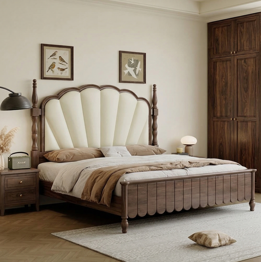 Wooden bed with upholstered headboard in a bedroom setting