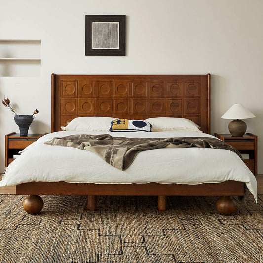Wooden bed with white bedding in a bedroom setting