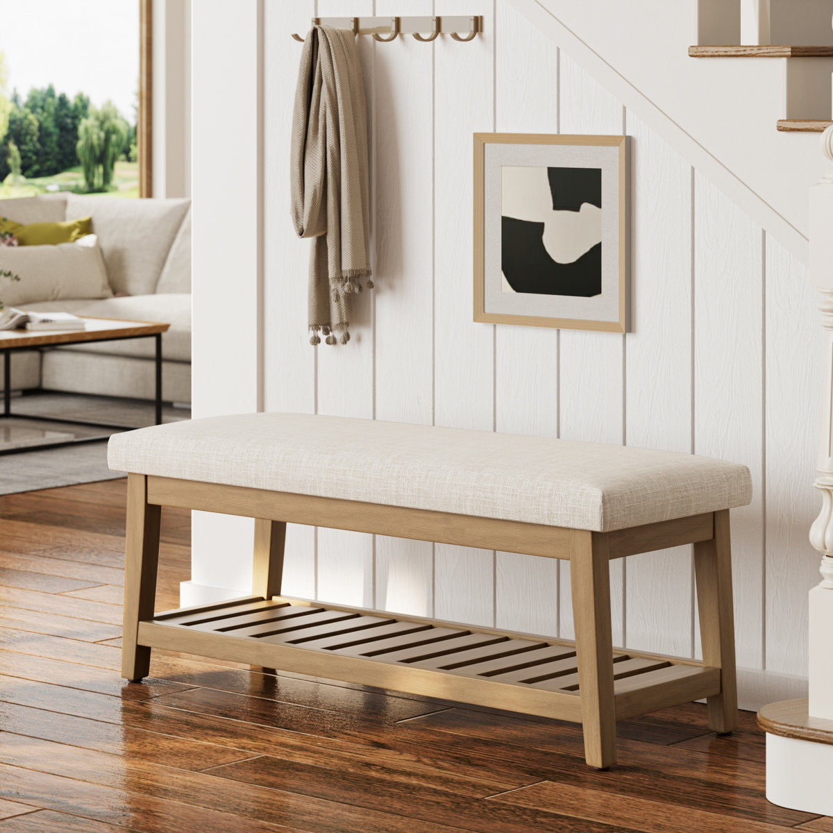Wooden bench with a cushioned seat in a living room setting.