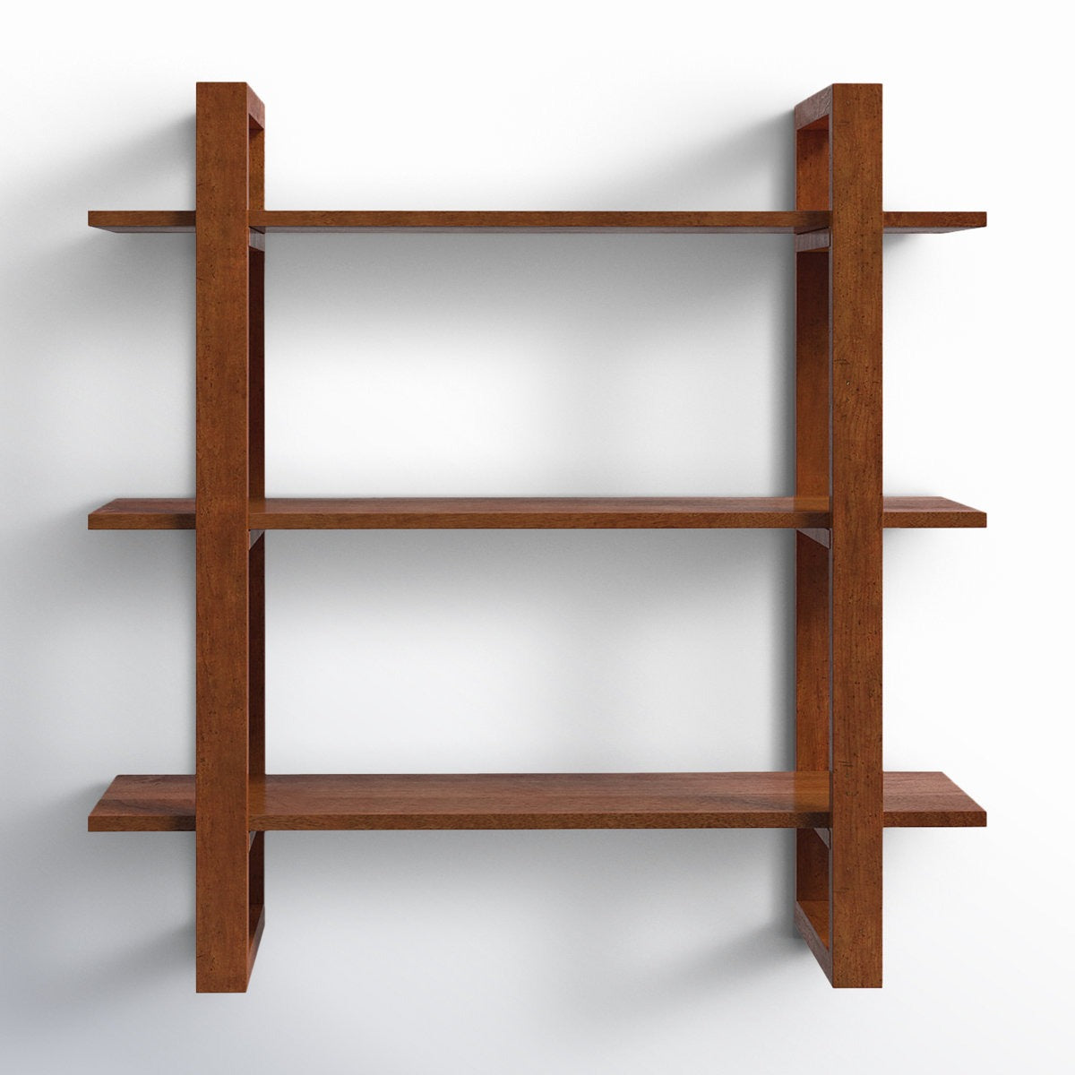 Wooden bookshelf with three shelves on a white background