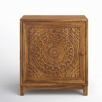 Wooden cabinet with intricate carvings on a white background