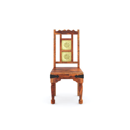 Wooden chair with intricate design on a white background