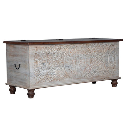 Wooden chest with decorative carvings on a white background