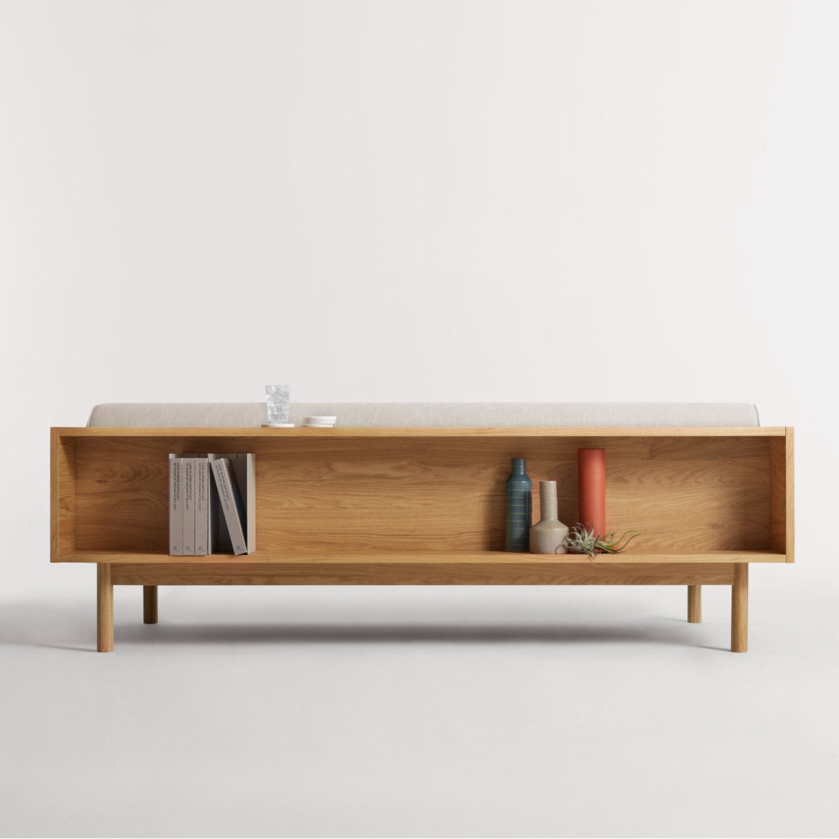 Wooden coffee table with a white top on a light gray background
