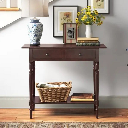 Wooden console table with decorative items in a home setting