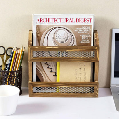 Wooden desk organizer with magazines and stationery items on a desk.