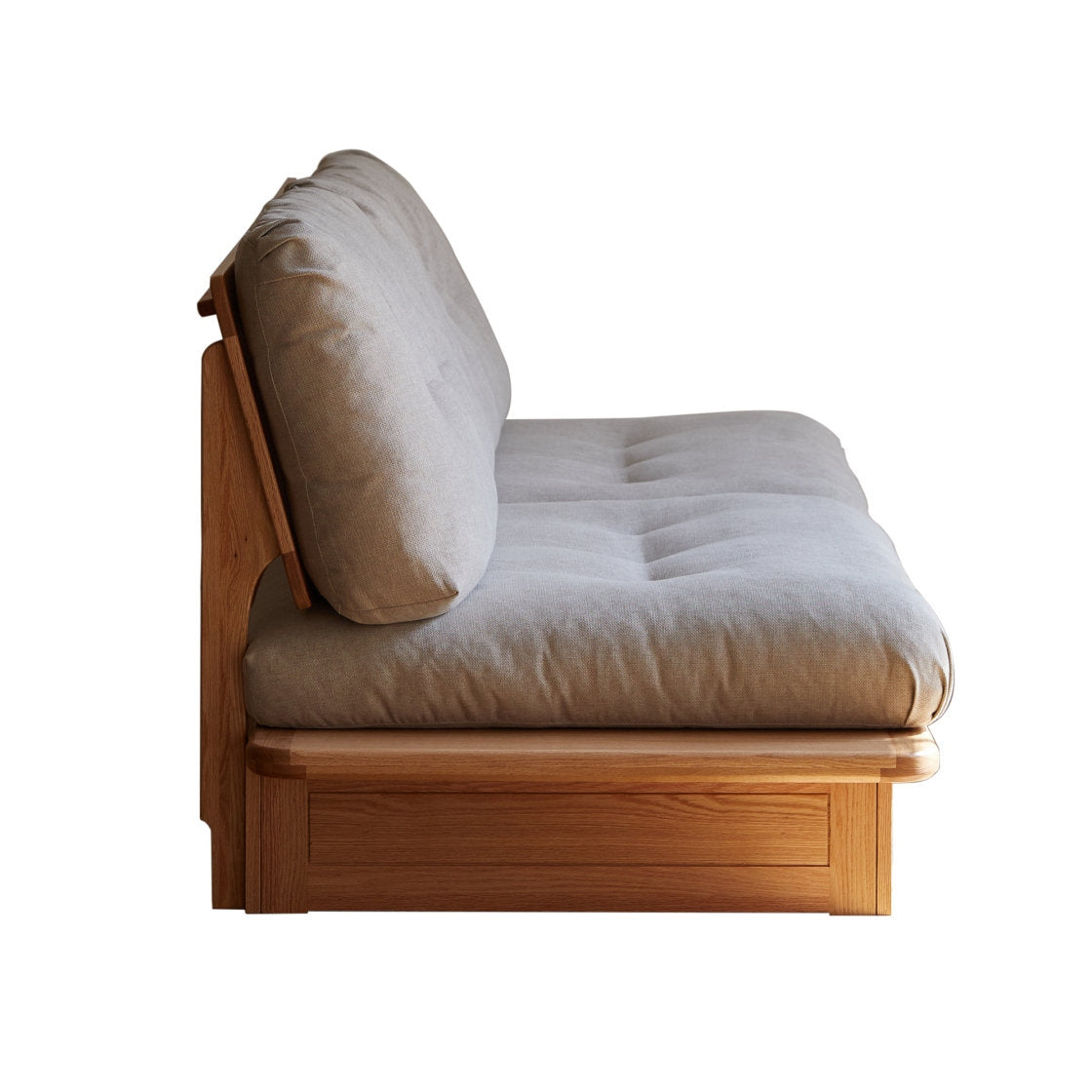 Wooden futon with beige mattress on a white background
