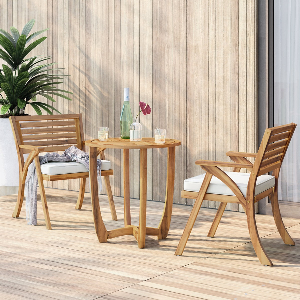 Wooden outdoor furniture set with two chairs and a small table on a wooden deck.