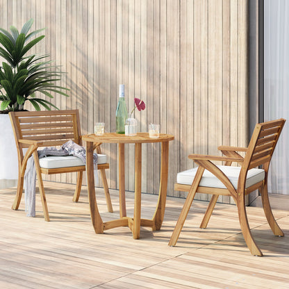 Wooden outdoor furniture set with two chairs and a small table on a wooden deck.