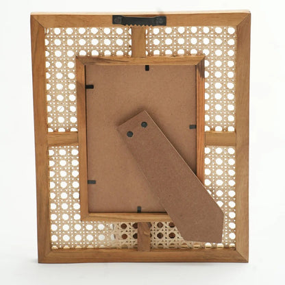 Wooden picture frame with a decorative lattice back on a white background