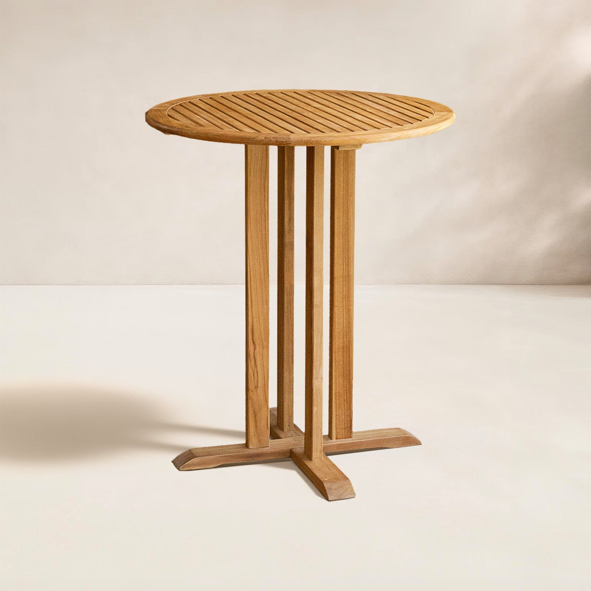 Wooden round table on a plain background