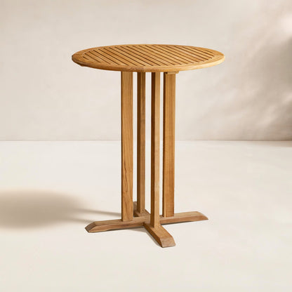 Wooden round table on a plain background