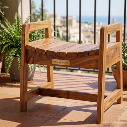 Wooden step stool on a patio with plants and a cityscape in the background