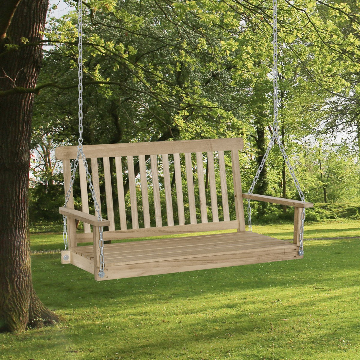 Wooden swing hanging from a tree in a park setting