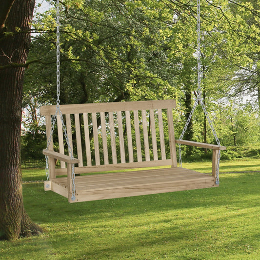 Wooden swing hanging from a tree in a park setting