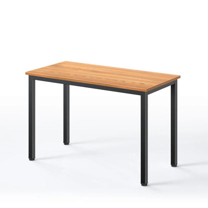 Wooden table with black metal legs on a white background