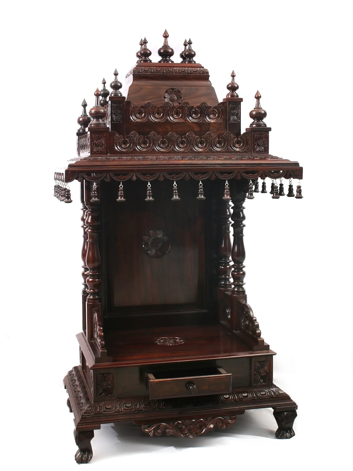 Wooden temple structure with intricate carvings on a white background