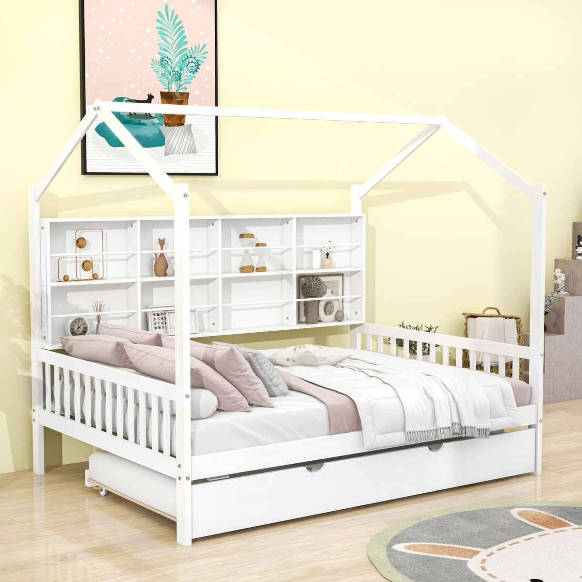 White children's bed with a house-shaped canopy in a room with a yellow wall.