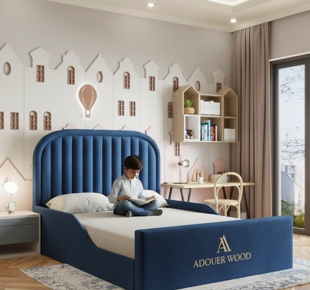 Children's bedroom with a blue bed and decorative wall.