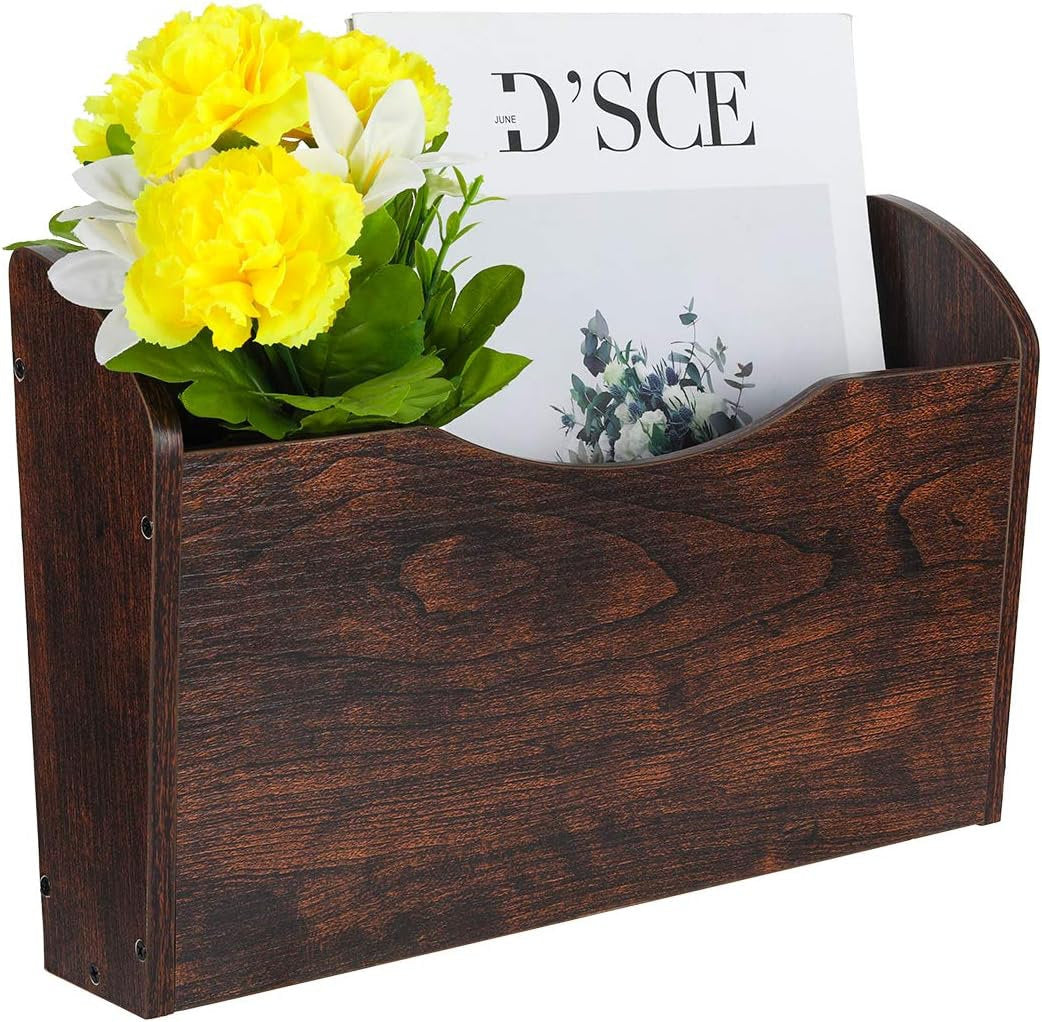 Wooden wall-mounted magazine holder with flowers and a magazine on a white background