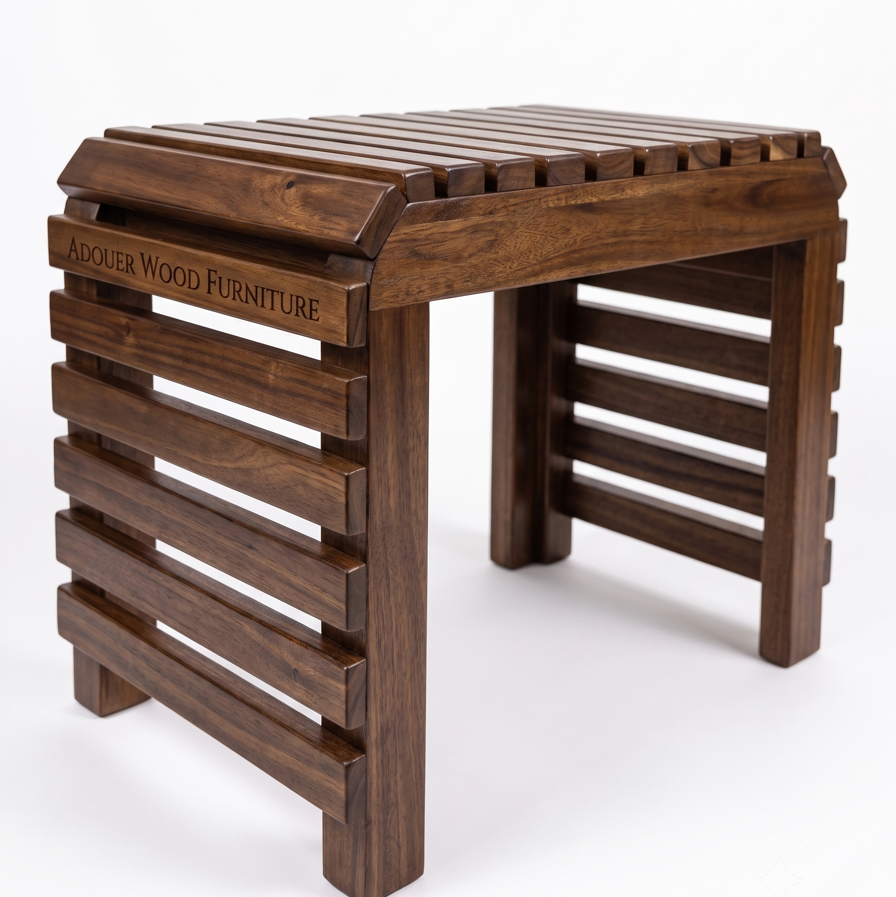 A dark brown wooden folding bench with a slatted seat, featuring the engraved brand name 'ADOUER WOOD FURNITURE' on the left side, set against a plain white background.