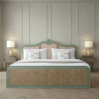 Bedroom with a bed featuring a green headboard and wicker design, flanked by two lamps on nightstands.