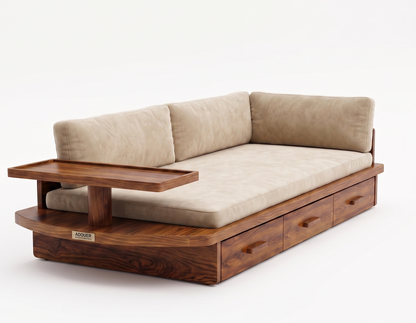 A mid-century modern wooden daybed with a dark walnut frame, beige velvet cushions, and a built-in side table, shown on a seamless white background.