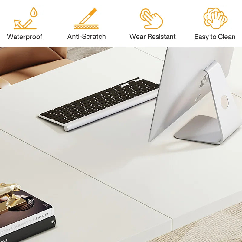 Keyboard and computer setup on a desk with icons indicating waterproof, anti-scratch, wear-resistant, and easy-to-clean features.