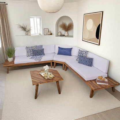 Modern living room with a sectional sofa, wooden coffee table, and decorative pillows.