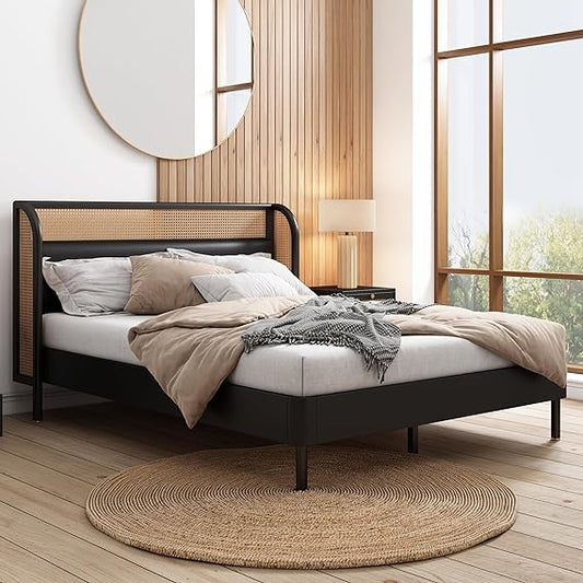 A vintage luxury standard rattan cane bed with a black and brown wood finish, placed in a room with a mirrored wall and a large window.