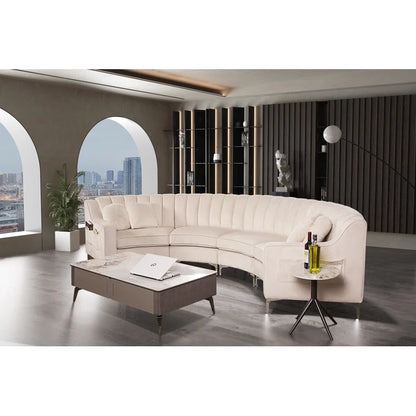 Modern living room with a curved beige sofa, coffee table, and side table.