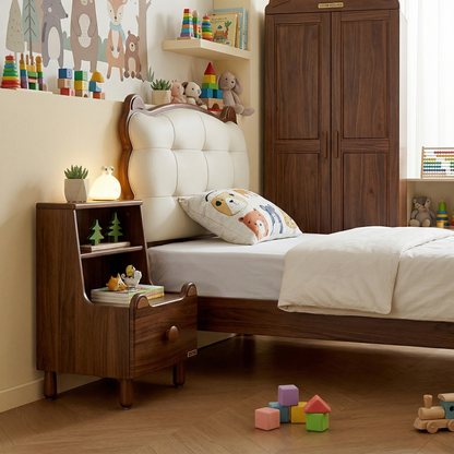 Children's bedroom with wooden bed, nightstand, and toys.