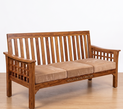 A wooden three-seat bench with a slatted back and arms, featuring three tan cushions. The brand name 'ADOUER WOOD FURNITURE' is printed on the front apron.