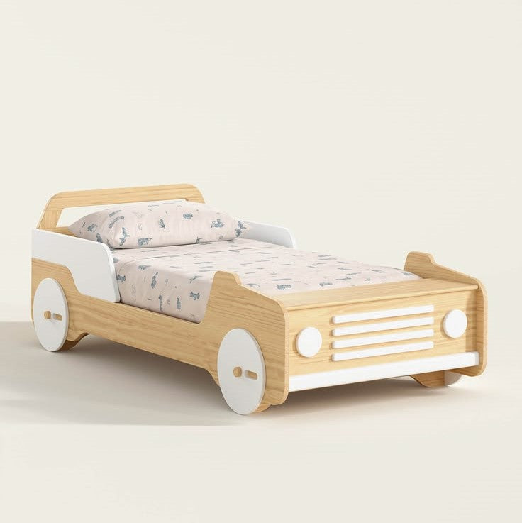 Children's bed designed like a car with wheels on a white back.