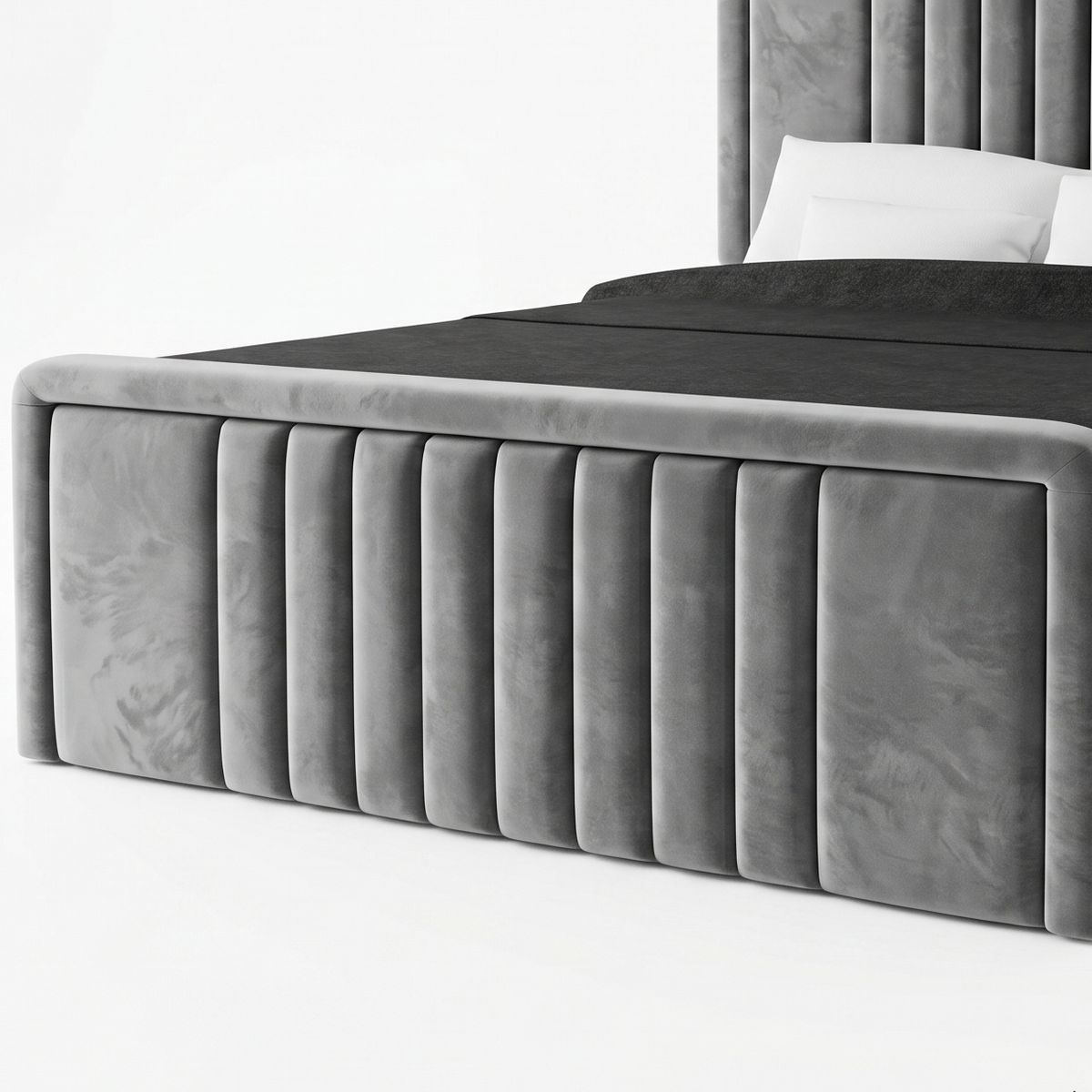Gray upholstered bed with a tufted headboard on a white background