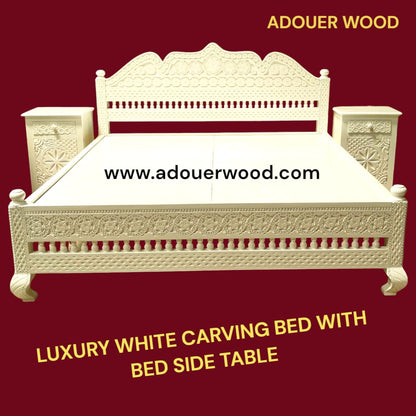 Luxury white carving bed with bed side table on a red background, featuring ADOUER WOOD  branding.