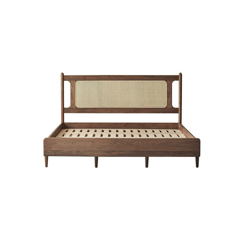 Mid-century modern wooden bed frame with a cane panel headboard and slatted base, shown on a plain white background.