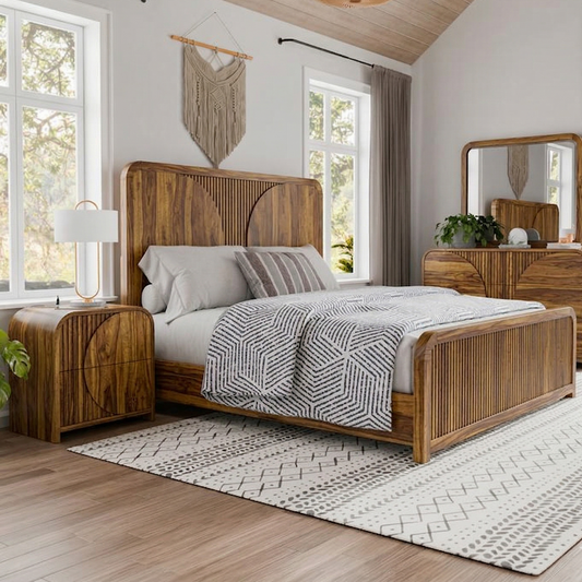 Wooden bed with matching nightstands and dresser in a bright bedroom.