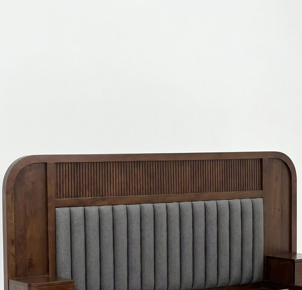 Wooden headboard with gray upholstered panel on a white background