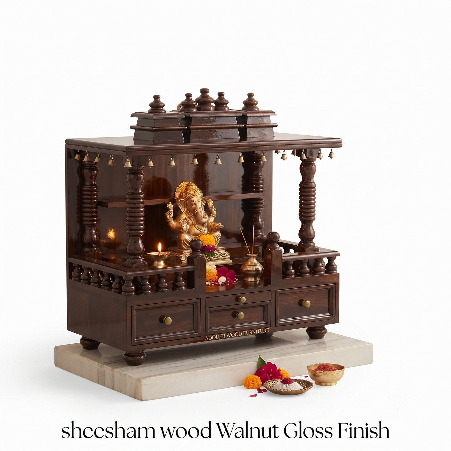 A dark brown sheesham wood Hanuman idol on a marble base with a walnut gloss finish, decorated with brass bells, a golden statue, and lit candles, set against a white background with text at the bottom.