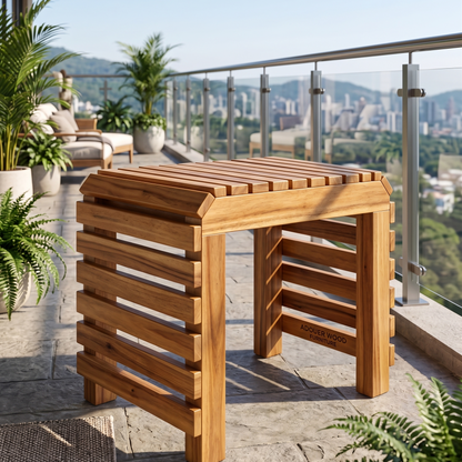 A rectangular wooden outdoor table with a slatted top and matching slatted side panels, shown on a stone patio with a city view and potted plants in the background.