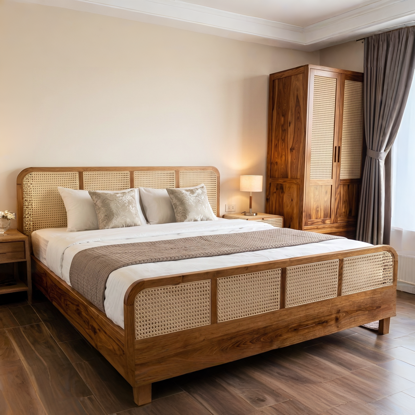 A warm-toned wooden bed frame with woven cane panels, styled with white and brown bedding in a modern bedroom setting with a matching wooden wardrobe and dark wood flooring.